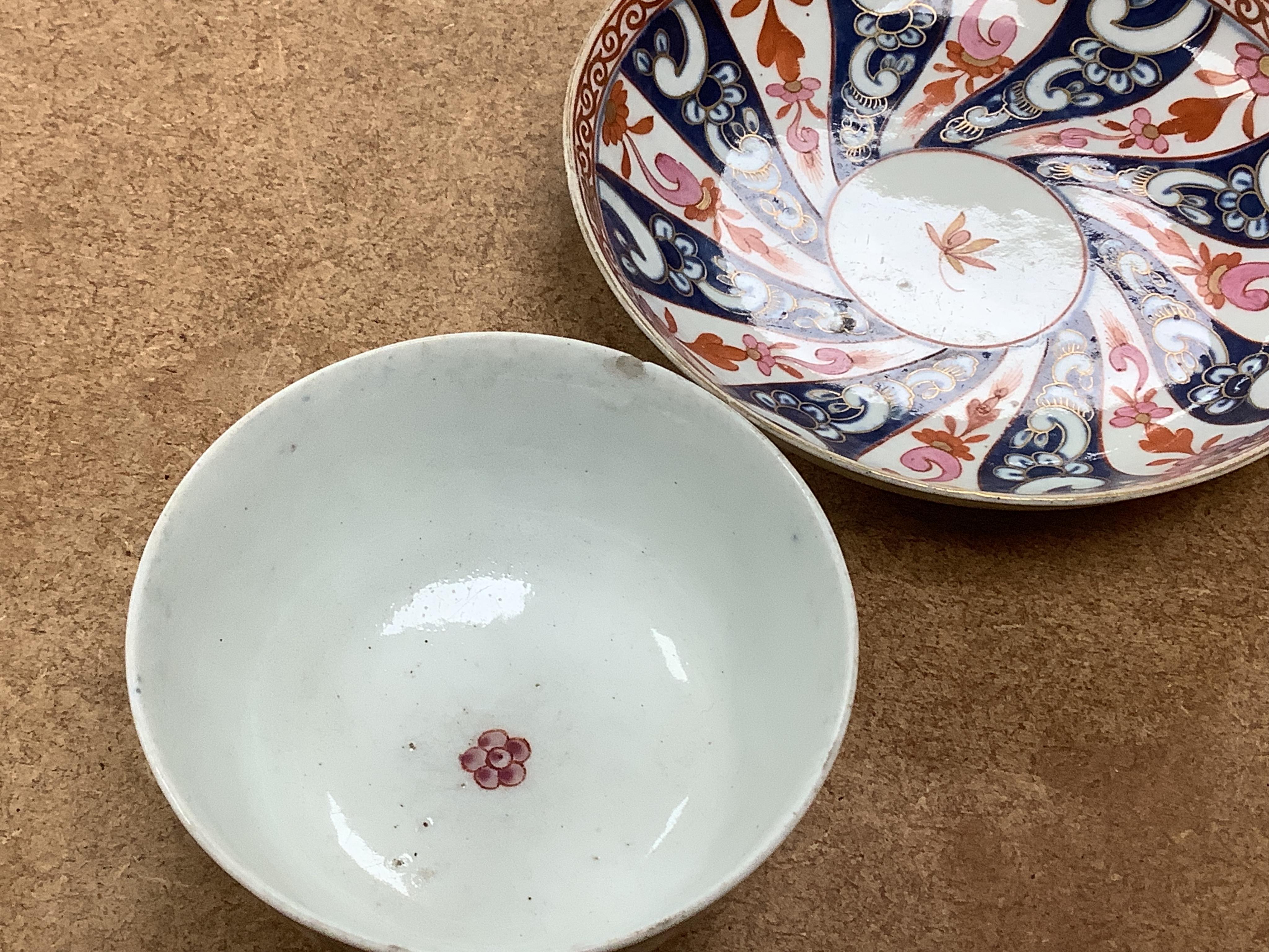 A Worcester Lord Henry Thynne type fluted tea bowl and saucer, c.1780, a group of Worcester Queen Charlotte pattern tea and coffee wares, c.1790-1810, two Worcester Kakiemon style dishes, largest 21cm in diameter